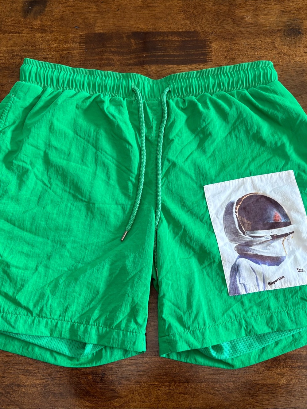 Supervsn Studio Green Astronaut Athletic Drawstring Swim Shorts Men’s Medium